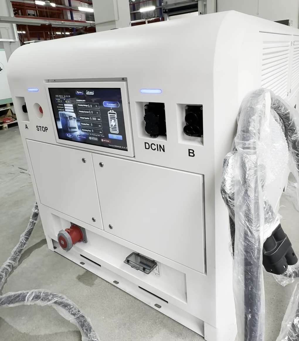 EG-Nova 150 Dual 150kW mobile DC fast EV charger three-quarter view EG-Nova 150 Dual 150kW battery-integrated DC fast EV charger with 180kWh LiFePO4 storage - three-quarter view showing dual-gun HMI, STOP button, DCIN inlet and 20kW PV-ready body